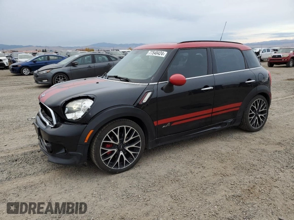 2016 MINI Countryman John Cooper Works with VIN WMWXD1C53GWS95325, listed as a Copart auction lot 77540424 with 98,951 mi miles and Salvage Title. Bid and sale history available at DreamBid. Image 1.