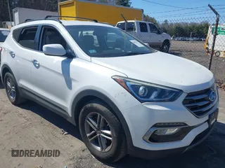 2017 Hyundai Santa Fe 2.4L z VIN 5NMZUDLB9HH028990, wystawiony jako IAAI lot #42055991 z przebiegiem 91 569 mil mil oraz . Historia ofert i sprzedaży dostępna na DreamBid. Obrazek 1.