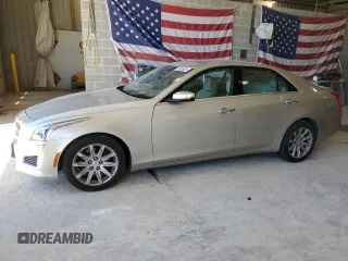 2014 Cadillac CTS Luxury AWD with VIN 1G6AX5S38E0130350, listed as a Copart auction lot 56565825 with 167,699 mi miles and Salvage title. Bid and sale history available at DreamBid. Image 1.