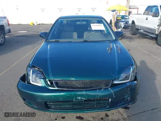 1999 Honda Civic VP with VIN 2HGEJ6617XH508270, listed as a IAAI auction lot 41319879 with 119,549 mi miles. Bid and sale history available at carsss.com. Image 12.