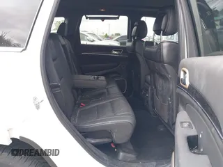 2014 Jeep Grand Cherokee Summit z VIN 1C4RJFJG2EC476114, wystawiony jako IAAI lot #42249108 z przebiegiem 97 569 mil mil oraz . Historia ofert i sprzedaży dostępna na DreamBid. Obrazek 8.