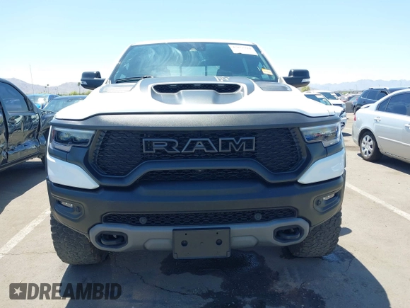 2022 Ram 1500 TRX with VIN 1C6SRFU95NN245954, listed as a IAAI auction lot 42032210 with 30,870 mi miles and . Bid and sale history available at DreamBid. Image 12.