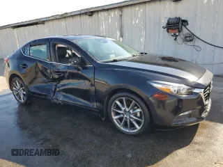 2018 Mazda 3 Touring with VIN 3MZBN1V38JM245479, listed as a Copart auction lot 52647885 with 65,045 mi miles and Clean Title. Bid and sale history available at DreamBid. Image 4.