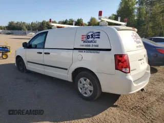 2013 Ram Cargo Van Tradesman with VIN 2C4JRGAGXDR596213, listed as a Copart auction lot 71063054 with 344,443 mi miles and Clean Title. Bid and sale history available at carsss.com. Image 2.