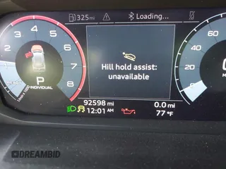 2021 Audi Q3 Premium with VIN WA1AUCF32M1066149, listed as a IAAI auction lot 40695269 with 92,598 mi miles and . Bid and sale history available at DreamBid. Image 16.