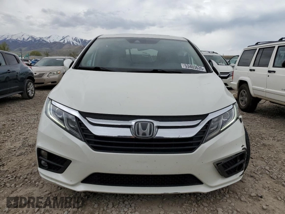 2018 Honda Odyssey EX-L with VIN 5FNRL6H71JB059936, listed as a Copart auction lot 53403635 with 94,745 mi miles and Salvage Title. Bid and sale history available at DreamBid. Image 5.