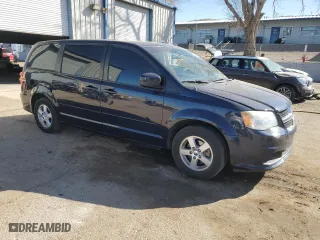 2012 Dodge Grand Caravan SXT with VIN 2C4RDGCG8CR395309, listed as a Copart auction lot 46191915 with 126,299 mi miles and Salvage Title. Bid and sale history available at carsss.com. Image 4.
