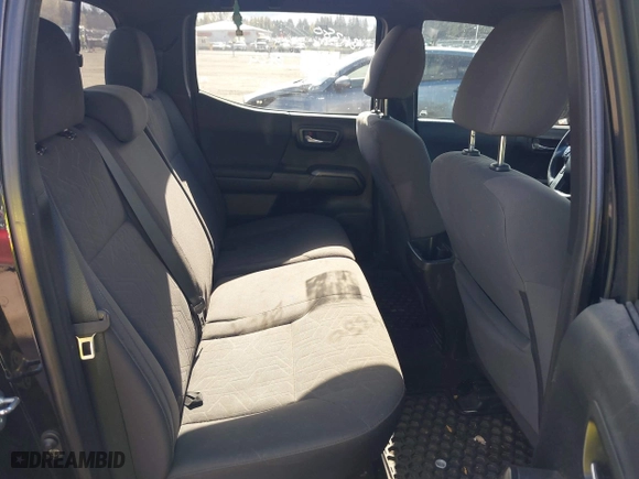 2016 Toyota Tacoma SR5 with VIN 5TFDZ5BN7GX001869, listed as a IAAI auction lot 40610002 with 184,380 mi miles. Bid and sale history available at carsss.com. Image 8.