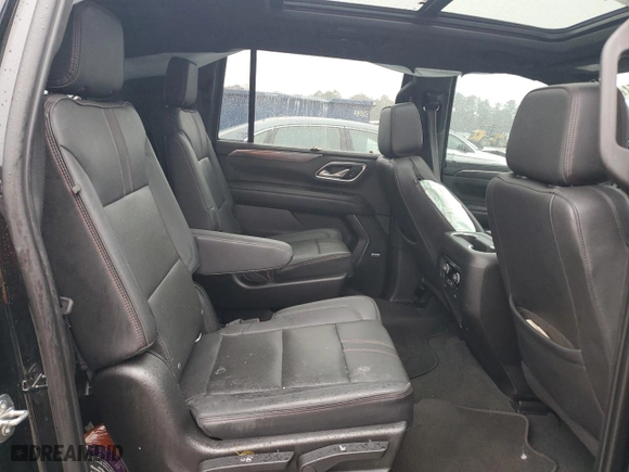 2021 Chevrolet Suburban RST with VIN 1GNSKEKD4MR210450, listed as a Copart auction lot 84372054 with 98,560 mi miles and Salvage Title. Bid and sale history available at carsss.com. Image 11.