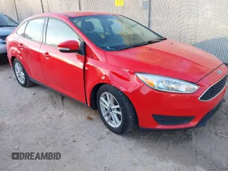 2016 Ford Focus SE with VIN 1FADP3F27GL271322, listed as a IAAI auction lot 41445039 with 100,195 mi miles. Bid and sale history available at carsss.com. Image 1.