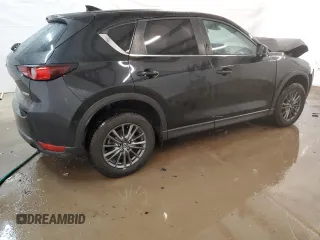 2021 Mazda CX-5 Sport with VIN JM3KFABM4M0334722, listed as a Copart auction lot 44021125 with 64,590 mi miles and Clean Title. Bid and sale history available at carsss.com. Image 3.