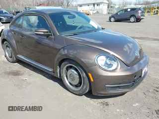 2013 Volkswagen Beetle 2.5L with VIN 3VWJP7AT1DM601306, listed as a IAAI auction lot 41846490 with 117,082 mi miles and . Bid and sale history available at DreamBid. Image 1.