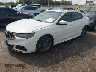 2018 Acura TLX w/A-SPEC Pkg z VIN 19UUB2F67JA008631, wystawiony jako IAAI lot #42039884 z przebiegiem 106 680 mil mil oraz . Historia ofert i sprzedaży dostępna na DreamBid. Obrazek 2.