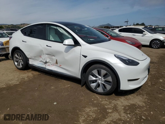 2023 Tesla Model Y Long Range z VIN 7SAYGDEE3PF815088, wystawiony jako Copart lot #54849895 z przebiegiem 19 637 mil mil oraz Szkoda całkowita • Salvage title. Historia ofert i sprzedaży dostępna na DreamBid. Obrazek 4.