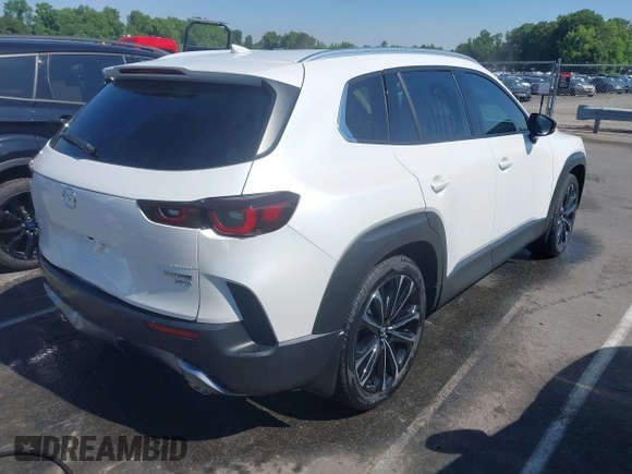 2024 Mazda CX-50 Premium Plus with VIN 7MMVABEY9RN207368, listed as a IAAI auction lot 42211942 with 13,940 mi miles and . Bid and sale history available at DreamBid. Image 4.