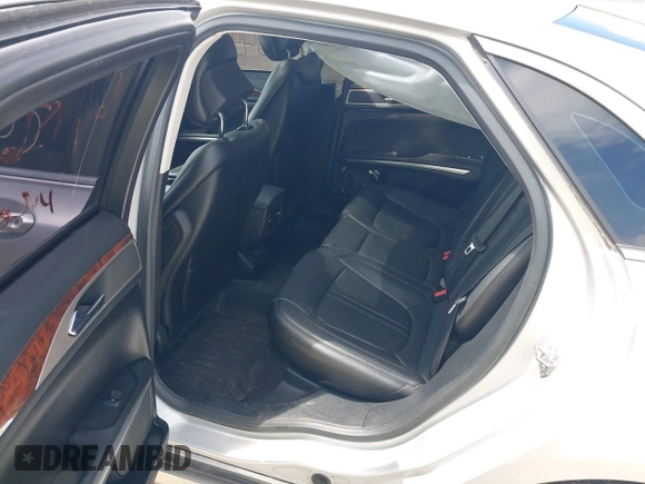 2015 Lincoln MKZ z VIN 3LN6L2GK5FR622117, wystawiony jako IAAI lot #42164455 z przebiegiem 167 156 mil mil oraz . Historia ofert i sprzedaży dostępna na DreamBid. Obrazek 8.
