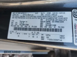 2015 Ford Fiesta SE with VIN 3FADP4EJ8FM221475, listed as a Copart auction lot 52404805 with 115,642 mi miles and Salvage Title. Bid and sale history available at carsss.com. Image 12.