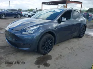 2022 Tesla Model Y Long Range with VIN 7SAYGAEE6NF341827, listed as a IAAI auction lot 41946388 with Not Provided miles and . Bid and sale history available at DreamBid. Image 18.