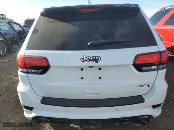 2015 Jeep Grand Cherokee SRT with VIN 1C4RJFDJ8FC687469, listed as a Copart auction lot 85270104 with 0 mi miles and Salvage Title. Bid and sale history available at carsss.com. Image 6.