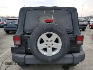 2010 Jeep Wrangler Sport with VIN 1J4AA2D15AL208420, listed as a Copart auction lot 50907635 with 133,840 mi miles and Salvage Title. Bid and sale history available at carsss.com. Image 6.