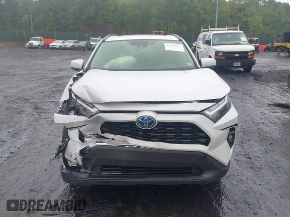 2023 Toyota RAV4 Hybrid XLE Premium z VIN JTMB6RFV3PD546700, wystawiony jako IAAI lot #42334903 z przebiegiem 53 853 mil mil oraz . Historia ofert i sprzedaży dostępna na DreamBid. Obrazek 12.