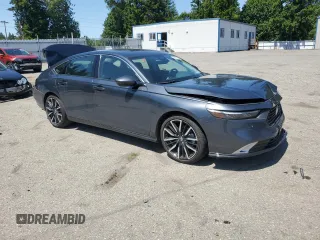 2024 Honda Accord Touring with VIN 1HGCY2F87RA005817, listed as a Copart auction lot 59211165 with 28,355 mi miles and Salvage title. Bid and sale history available at DreamBid. Image 4.