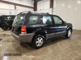 2001 Ford Escape XLS with VIN 1FMYU02121KA65155, listed as a Copart auction lot 42021865 with 0 mi miles and Non Repairable. Bid and sale history available at carsss.com. Image 3.