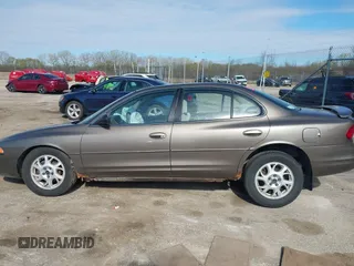 2000 Oldsmobile Intrigue GX z VIN 1G3WH52H0YF280823, wystawiony jako IAAI lot #42199925 z przebiegiem 102 427 mil mil oraz . Historia ofert i sprzedaży dostępna na DreamBid. Obrazek 14.