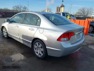 2010 Honda Civic Sdn LX with VIN 19XFA1F55AE071252, listed as a IAAI auction lot 39065549 with 142,676 mi miles. Bid and sale history available at carsss.com. Image 3.