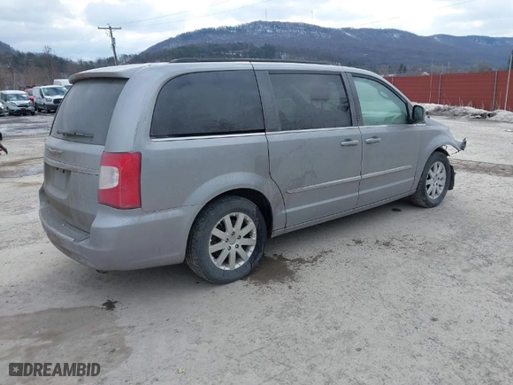 2014 Chrysler Town & Country Touring with VIN 2C4RC1BG8ER218358, listed as a IAAI auction lot 41412291 with 142,403 mi miles. Bid and sale history available at carsss.com. Image 4.