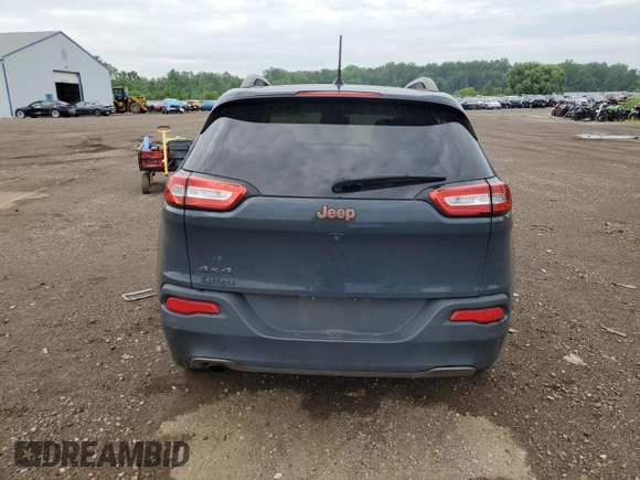 2016 Jeep Cherokee Altitude with VIN 1C4PJMCB0GW348615, listed as a Copart auction lot 61194105 with 124,840 mi miles and Salvage title. Bid and sale history available at DreamBid. Image 6.