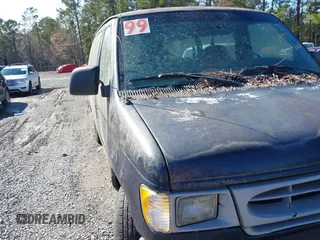 1999 Ford Econoline Cargo with VIN 1FTRE1422XHA33460, listed as a IAAI auction lot 41326443 with 119,294 mi miles. Bid and sale history available at carsss.com. Image 1.