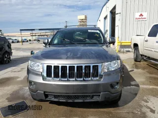 2012 Jeep Grand Cherokee Laredo with VIN 1C4RJEAG1CC306950, listed as a Copart auction lot 84912434 with 128,659 mi miles and Salvage Title. Bid and sale history available at carsss.com. Image 5.