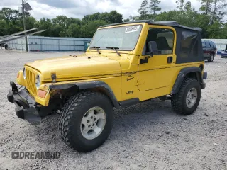 2001 Jeep Wrangler Sport z VIN 1J4FA49S21P364538, wystawiony jako Copart lot #63008885 z przebiegiem 245 645 mil mil oraz Szkoda całkowita • Salvage title. Historia ofert i sprzedaży dostępna na DreamBid. Obrazek 1.