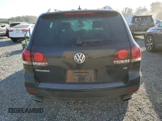 2010 Volkswagen Touareg VR6 with VIN WVGBF7A92AD002237, listed as a Copart auction lot 73919754 with 124,072 mi miles and Salvage Title. Bid and sale history available at DreamBid. Image 6.
