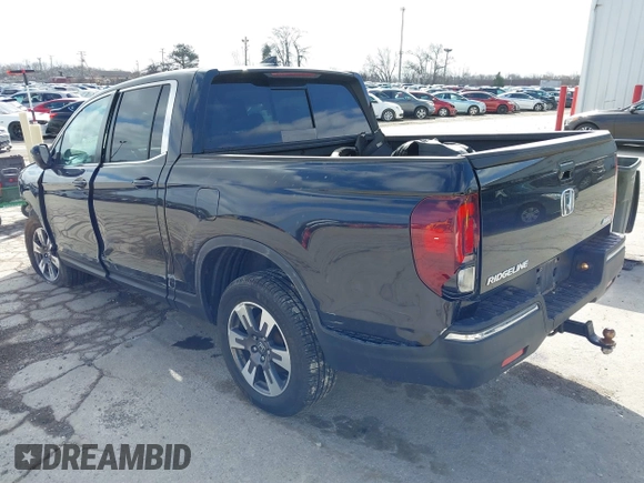 2019 Honda Ridgeline RTL z VIN 5FPYK3F50KB000027, wystawiony jako IAAI lot #41856522 z przebiegiem 98 590 mil mil oraz . Historia ofert i sprzedaży dostępna na DreamBid. Obrazek 3.