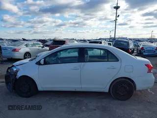 2008 Toyota Yaris with VIN JTDBT903284035531, listed as a IAAI auction lot 41591330 with 142,123 mi miles. Bid and sale history available at carsss.com. Image 14.