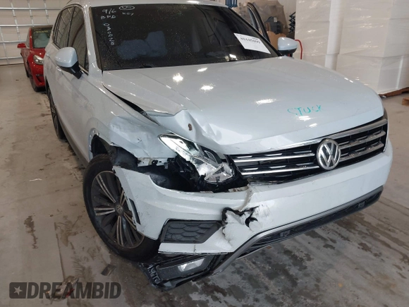 2019 Volkswagen Tiguan SE with VIN 3VV3B7AX9KM030028, listed as a IAAI auction lot 40445099 with 85,400 mi miles and . Bid and sale history available at DreamBid. Image 6.
