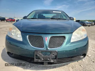2007 Pontiac G6 G6 with VIN 1G2ZG58N074180653, listed as a Copart auction lot 61955275 with 93,294 mi miles and Salvage title. Bid and sale history available at DreamBid. Image 5.