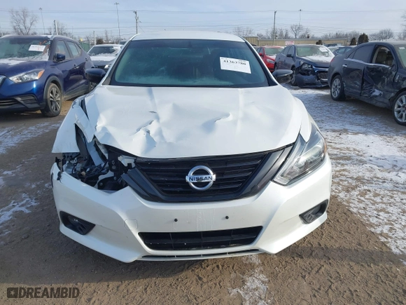 2018 Nissan Altima 2.5 SL with VIN 1N4AL3AP9JC299809, listed as a IAAI auction lot 41363780 with 33,507 mi miles. Bid and sale history available at carsss.com. Image 12.
