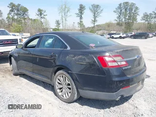 2014 Ford Taurus Limited with VIN 1FAHP2F80EG105147, listed as a IAAI auction lot 41899174 with 137,451 mi miles and . Bid and sale history available at DreamBid. Image 14.
