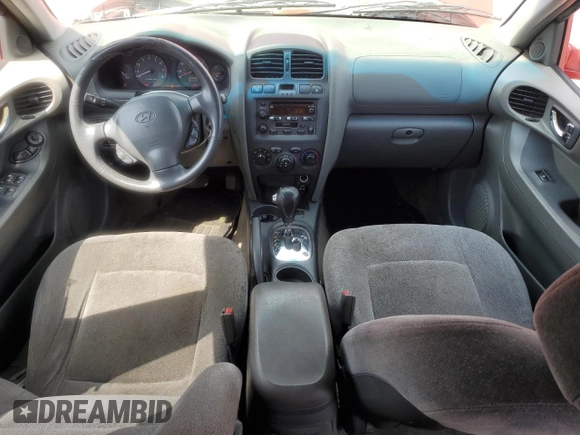 2003 Hyundai Santa Fe GLS z VIN KM8SC13D83U498381, wystawiony jako Copart lot #55393305 z przebiegiem 140 852 mil mil oraz Szkoda całkowita • Salvage title. Historia ofert i sprzedaży dostępna na DreamBid. Obrazek 8.