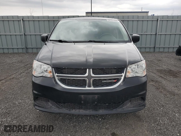 2015 Dodge Grand Caravan SE with VIN 2C4RDGBGXFR744203, listed as a Copart auction lot 54791795 with 216,594 mi miles and Clean Title. Bid and sale history available at DreamBid. Image 5.