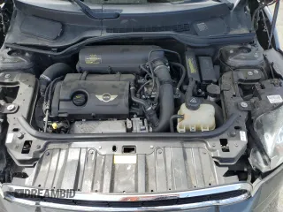 2011 MINI Countryman S with VIN WMWZC5C5XBWL55516, listed as a Copart auction lot 63239235 with 137,545 mi miles and Salvage title. Bid and sale history available at DreamBid. Image 11.