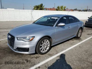 2016 Audi A6 2.0T Premium Plus with VIN WAUGFAFC2GN124981, listed as a Copart auction lot 43656653 with 74,400 mi miles. Bid and sale history available at carsss.com. Image 1.