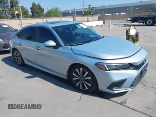 2022 Honda Civic Sedan EX with VIN 2HGFE1F77NH309152, listed as a IAAI auction lot 42013565 with 25,474 mi miles. Bid and sale history available at carsss.com. Image 1.