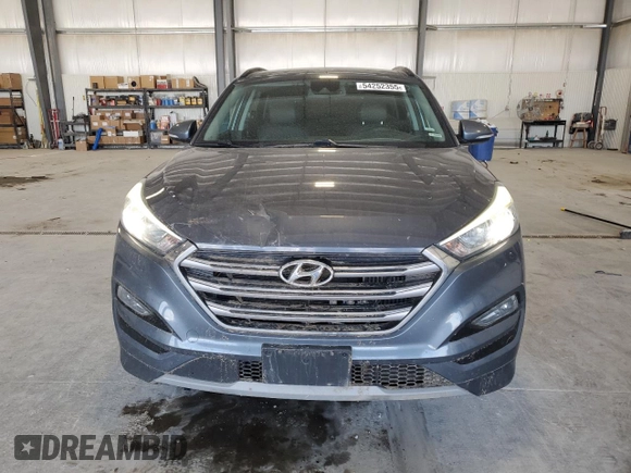 2017 Hyundai Tucson Sport with VIN KM8J3CA20HU594697, listed as a Copart auction lot 54252355 with 98,696 mi miles and Salvage Title. Bid and sale history available at DreamBid. Image 5.