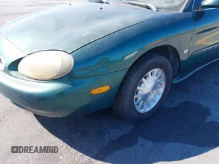 1999 Mercury Sable LS z VIN 1MEFM53S7XA612899, wystawiony jako IAAI lot #41687188 z przebiegiem 155 128 mil mil oraz . Historia ofert i sprzedaży dostępna na DreamBid. Obrazek 12.