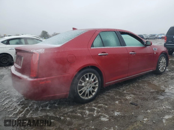 2010 Cadillac STS AWD z VIN 1G6DU6EV3A0131148, wystawiony jako Copart lot #44047375 z przebiegiem 147 556 mil mil oraz Szkoda całkowita • Salvage title. Historia ofert i sprzedaży dostępna na DreamBid. Obrazek 3.