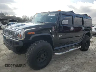 2004 Hummer H2 with VIN 5GRGN23U54H118187, listed as a Copart auction lot 76258264 with 169,531 mi miles and Salvage Title. Bid and sale history available at carsss.com. Image 1.